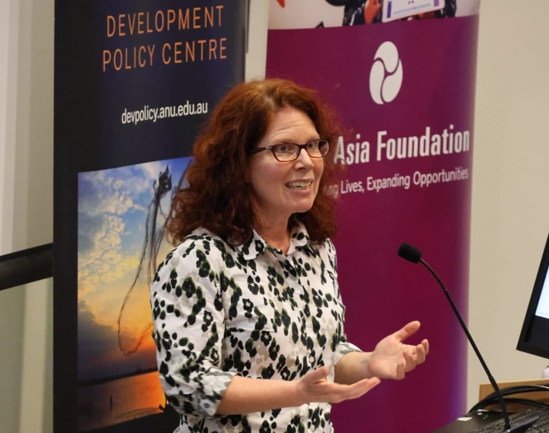 Miranda Forsyth presenting at the 2024 Australasian Aid Conference